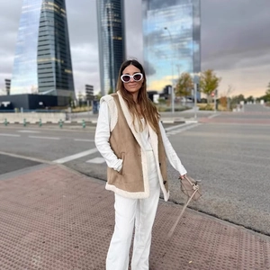Fashionable khaki faux suede vest with plush faux shearling trim for autumn outdoor wear