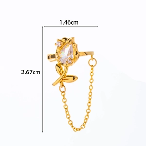 Detailed measurement of golden tulip ring with cubic zirconia and chain pendant charms