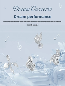 Macro detail of S925 sterling silver music charms with sparkling crystals and engraving