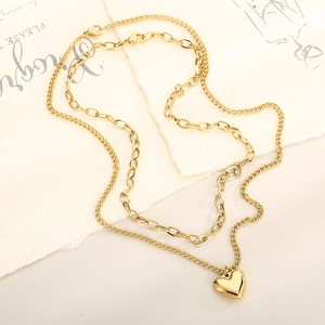 Double-layer gold stainless steel necklace featuring a stylish heart pendant for women