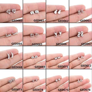 Collection of 16 mini silver stainless steel stud earrings in cute animal and geometric shapes