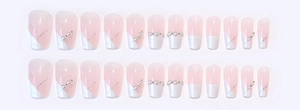 Detail of 24pcs pink and white French press-on nails with pearls and silver lines