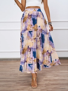 Detail of high-waist pleated midi skirt with colorful abstract oil painting print