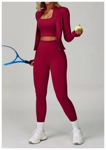 Three-piece burgundy fitness set including zip jacket, tank top, and high-waist yoga leggings