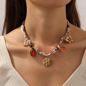 Vintage floral silk ribbon necklace with sunflower, butterfly and gemstone pendants