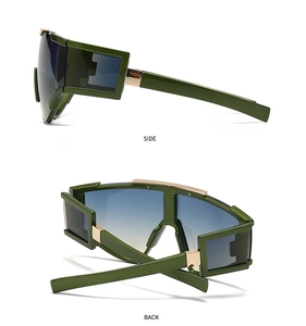 Detail view of green oversized sunglasses with gradient lenses showing side and back structure