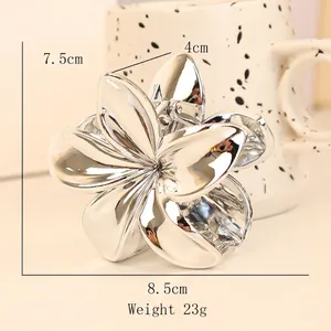 Silver metallic flower hair claw clip for women featuring a minimalist 5-petal design