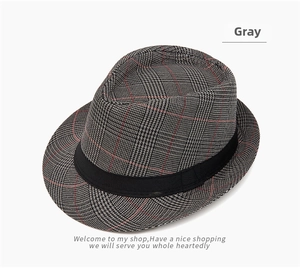 Detailed top view of a gray houndstooth fedora hat with red check lines and black band