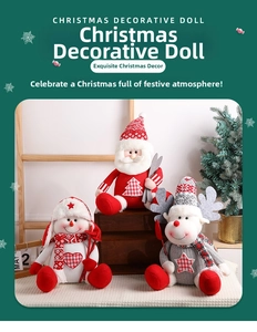 Close-up of knit Christmas dolls featuring Santa, snowman and reindeer on wooden steps