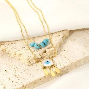 Böhmische goldene Doppelschicht-Halskette mit Evil Eye Anhänger und himmelblauen Perlen