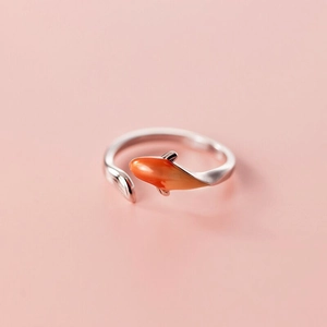 Macro detail of silver adjustable ring featuring a gradient orange enamel koi fish charm