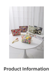 Detail of floral canvas cosmetic bags with various botanical prints and zipper closure