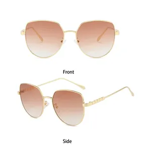 Stylish gold metal cat eye oversized sunglasses with brown gradient lenses for women