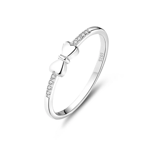 Elegant 925 sterling silver bow ring with shimmering zircon stones on a white background