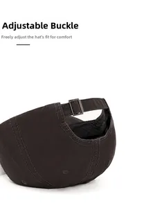 Detail of adjustable metal buckle on back of dark brown washed cotton baseball cap