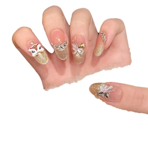 Luxurious gold glitter press-on nails with 3D lion dance and butterfly crystal charms