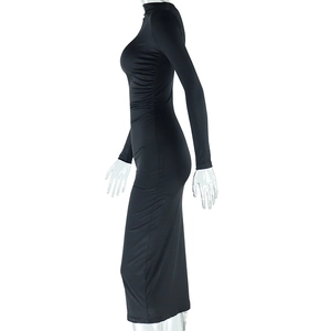 Detail of black long-sleeve bodycon dress with side ruching on a transparent mannequin
