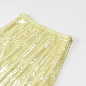Mini-jupe chic à paillettes jaune pâle avec taille étroite et fermeture éclair invisible