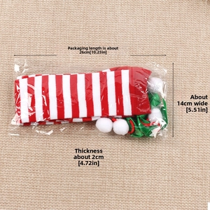 Christmas striped over-knee socks with bow and pom-poms in packaging, size 26x14cm