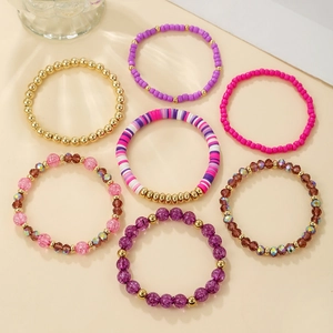 Detail of 7-piece acrylic crystal bead bracelet set with mixed textures and colors