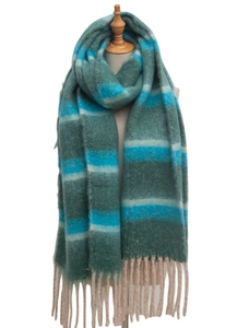 Close-up of green and blue striped knit scarf featuring long beige fringe tassels