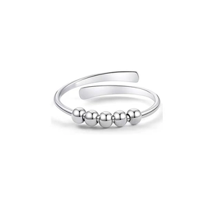 Silver adjustable anxiety ring with five movable beads on a clean white background