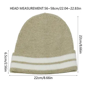Guide des tailles détaillé pour bonnet rayé indiquant le tour de tête 56 à 58 cm