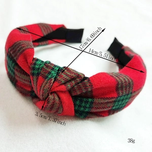 Detailed size specifications for red and green plaid knotted headband with dimensions