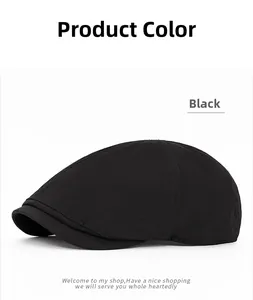 Close-up of a black ivy cap showing breathable fabric texture and decorative side stitching