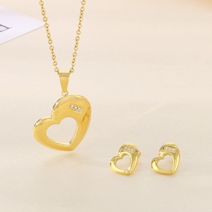 Elegant gold-plated stainless steel hollow heart necklace and stud earrings set with crystals