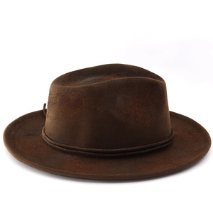 Detail of vintage brown wide brim fedora hat featuring classic woven rope band decoration