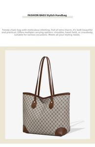 Close-up of vintage monogram tote bag with brown leather handles and reinforced base