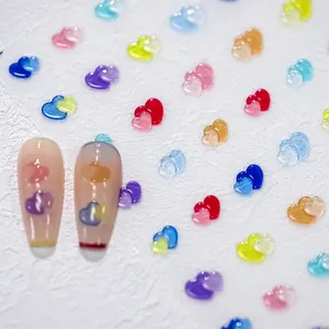 Colorful double heart nail art charms with glossy resin finish for creative DIY manicure