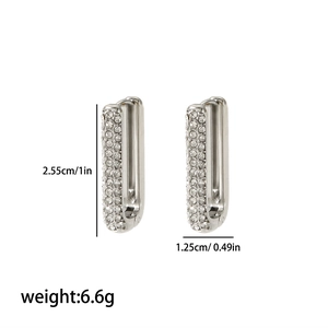Detailed size chart for silver U-shaped earrings with rhinestones, 2.55cm by 1.25cm
