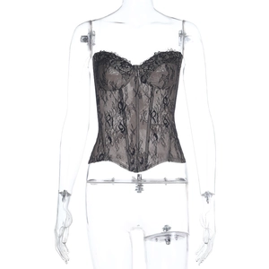 Detail of black lace corset top with floral embroidery and structured boning support