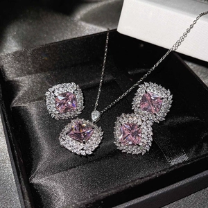 Luxury pink square-cut gemstone jewelry set with necklace and ring in a black gift box