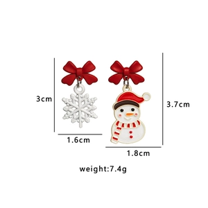 Detailed view of asymmetric Christmas snowman and snowflake earrings with dimensions