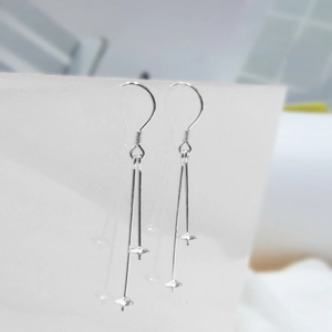 Detailed macro view of S925 sterling silver earring hooks with pin base for DIY jewelry