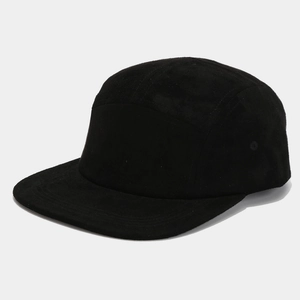 Detail of premium black suede 5-panel baseball cap showing rich matte fabric texture