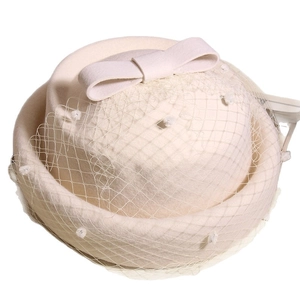French vintage wool beret with mesh bow and white polka dot veil in elegant cream white