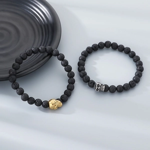 Halloween black lava stone beaded bracelets with gold and silver skull charms