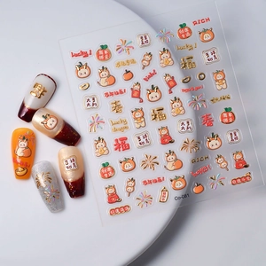 Close-up of gold embossed Dragon New Year nail art stickers with Co-081 3D design