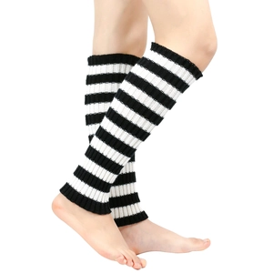 Detail showing elastic knitted texture and black and white stripes on leg warmers