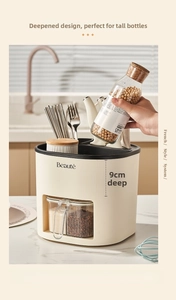 Detail view of kitchen organizer showing 9cm deepened storage for tall spice bottles