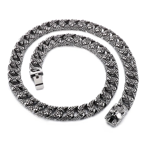 Retro stainless steel Cuban chain necklace with a textured skull clasp for men