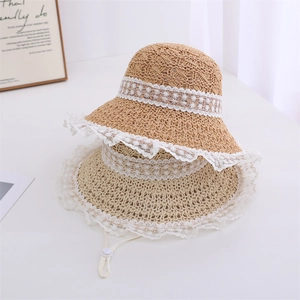 Girl's summer straw hat with lace daisy embroidery and adjustable windproof rope