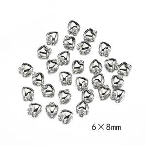 Macro shot of silver heart-shaped CCB beads measuring 6x8mm for DIY jewelry making