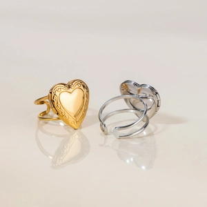 Golden and silver stainless steel heart locket rings in a minimalist open design