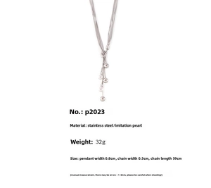 Detail of multi-layer stainless steel tassel necklace with pearls and 59cm length