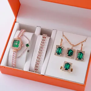 Elegant 5-piece rose gold watch and jewelry set with emerald green crystals in a gift box